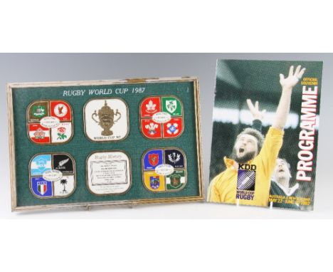 1987 Inaugural Rugby World Cup Display and programme - comprising six x coasters decorated with the crests of each team and t