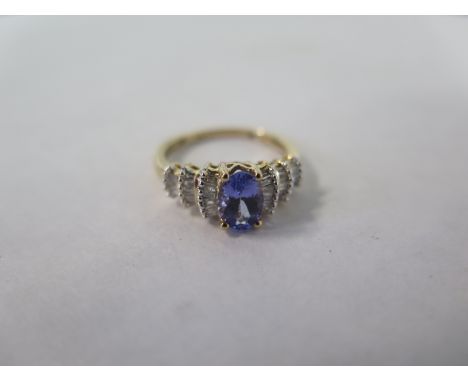 A 9ct tanzanite and zircon set ring - size K, approx 2.4 grams, in good condition 