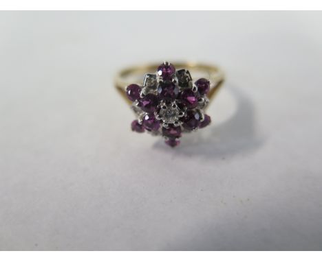 A 9ct ruby and diamond cluster ring, size Q, approx 3.4 grams, some light wear, otherwise in good condition 