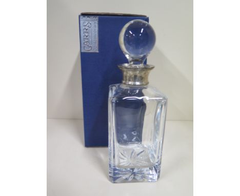 A Carrs contemporary collection, silver collared, cut glass decanter with original box, some light wear to decanter, box with