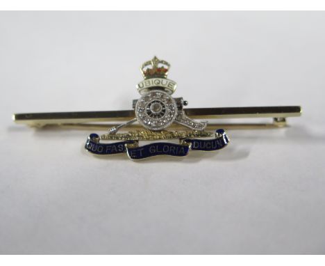 A 15ct yellow gold diamond and enamel Royal Artillery sweetheart brooch, approx 5.8 grams, 5cm long, generally good 