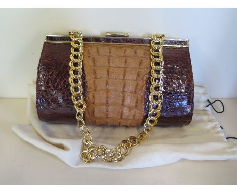 A high quality Vintage alligator skin handbag approx 25cm x 16cm x 7cm on a golden chain, comes with dust bag - clean conditi