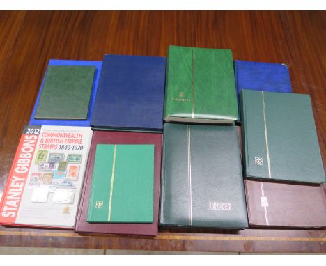 A collection of twelve stock-books of varying sizes and a 2012 Stanley Gibbons Commonwealth catalogue with all items in good 