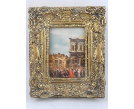 A Viennese ceramic plaque depicting a Florentine street scene, with a giltwood frame. 