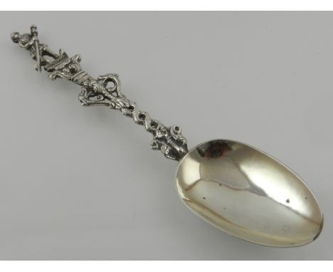 A 19th century Dutch silver christening spoon, with cast pierced handle and finial, depicting a gondolier, makers mark 'G.U'.
