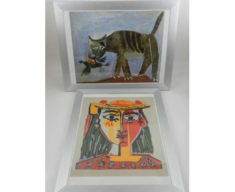 An art print of Woman with Hat by Pablo Picasso,  H.40cm W.30cm, together with another art print of Cat Catching Bird. H.30cm