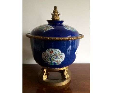 Powder blue porcelain bowl with enamel panels and gilt mounts