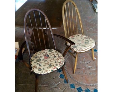 Ercol dining suite, two elbow chairs, four dining chairs and table, all mid brown.