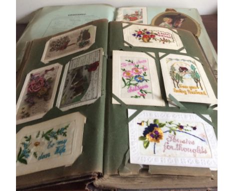 Vintage postcard album inc. embroidered and a sample book from 
