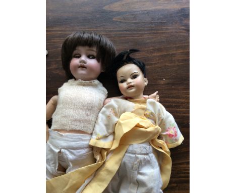 Armand Marseilles 390 bisque headed doll in good order together with another a/f