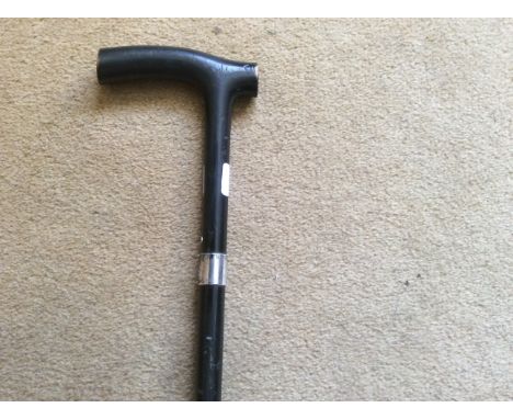 Silver banded walking stick, hallmarked and makers label for James Howell London.