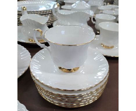 A Royal Albert white and gold "Val D'or" dinner, tea and coffee service (128) Oval dish, bowl 4 scallop-edge dishes, 9 small 