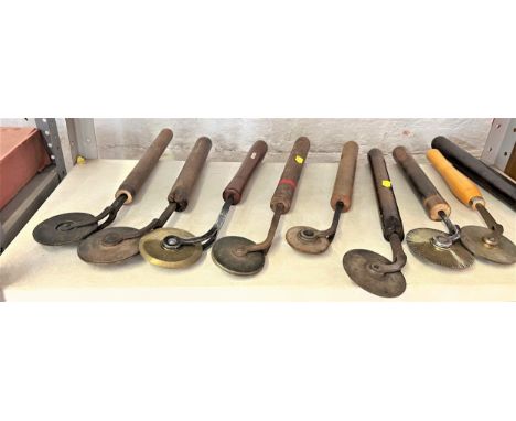 Book Binding finishing tools. Including, Nine Decorative rolls. probably antique. 