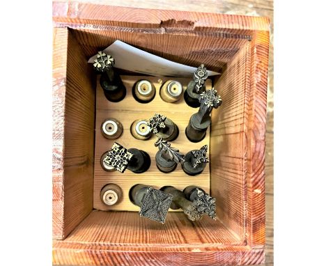 Three boxes of Book Binding leather embossing tools, including centre tools and Elizabethan 24pt dies. 