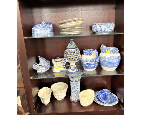 Blue and white table wares including Copeland Spode Italian, Hogarth, Adams, and three plain white jelly moulds. 