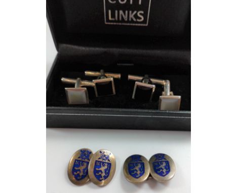 Three silver mounted cuff links, one set Birmingham hallmark with enamel rampant lion