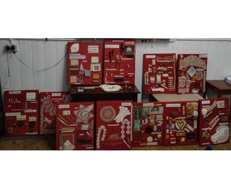 A large Collection of needlework and Embroidery Tools, mounted on cardboard.