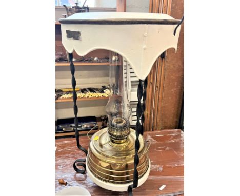 A Belgique brass oil lamp with a portable stand, overall height 83cm
