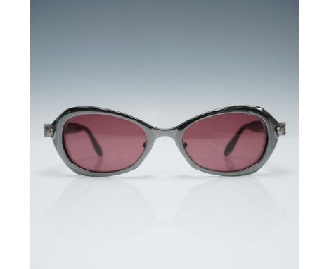 Kieselstein-Cord Diva sunglasses featuring a lightweight titanium frame with sculptural black acetate overlay and soft pink-t