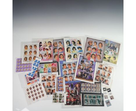 Lot of 21 items including commemorative and collectible postage stamp sheets primarily featuring John F. Kennedy, Jackie Kenn