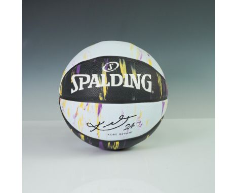 Spalding Size 7 basketball featuring a vibrant purple, yellow, and black splatter design over a white base, prominently displ