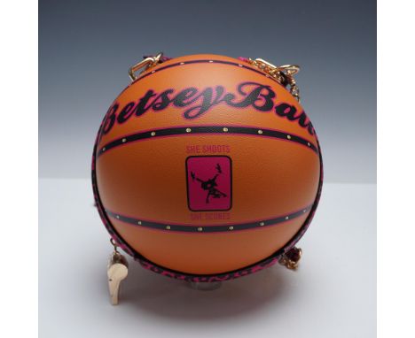 Whimsical and sporty, this Betsey Johnson basketball-shaped purse features pink and black leopard-print trim, gold-tone hardw