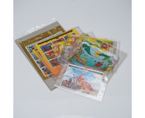 Lot of 15 Disney-themed commemorative stamp sheets, issued by international postal authorities including Uganda and Canada. T