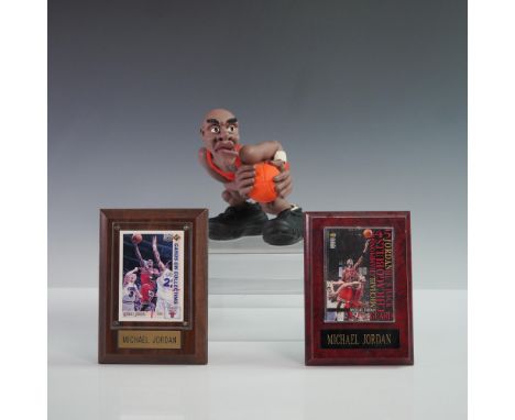 Three-piece Michael Jordan collectible lot featuring two trading cards mounted on individual plaques and a stylized figurine 