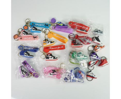 This fun 19pc collection features assorted sneaker-themed and basketball-themed keychains, each designed with vibrant colors 