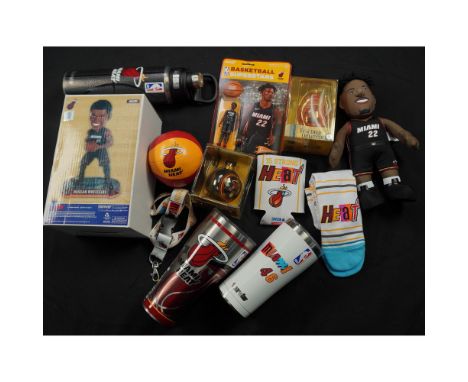 An exciting 12-piece Miami Heat memorabilia bundle perfect for passionate basketball fans. This set includes a pair of collec