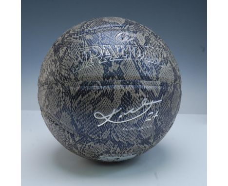Spalding 94 Series basketball featuring a faux snakeskin pattern and commemorative design honoring Kobe Bryant. The surface s