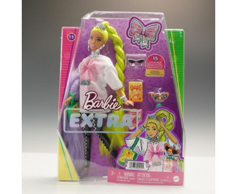 Barbie doll #11 featuring vibrant neon green braiding hair with a purple color exchangeable hair, star decorations, a bold si