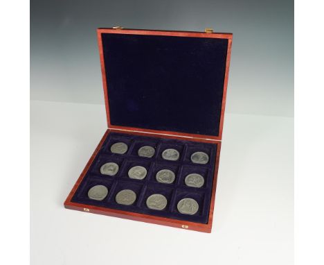 Twelve-piece collection of replica Comitia Americana pewter medals presented in a fitted wooden case with blue velvet-lined c