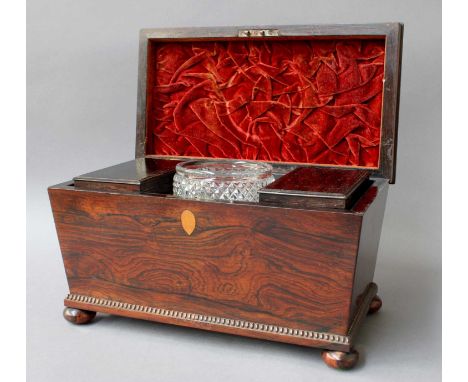 A Regency Rosewood Sarcophagus Form Two-Division Tea Caddy, with associated mixing bowl, and decorated with beaded borders on