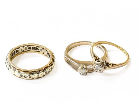 Two 18 Carat Gold Diamond Solitaire Rings, finger sizes I1/2 and K; and A 9 Carat Gold White Stone Eternity Ring, finger size