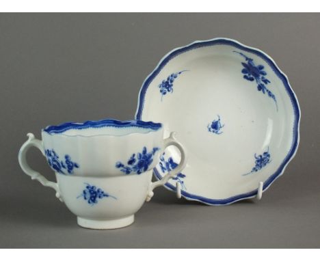 A Caughley chocolate cup and saucer painted with the Salopian Sprig pattern, circa 1785-92, S mark, the cup 10.2cm diameter, 