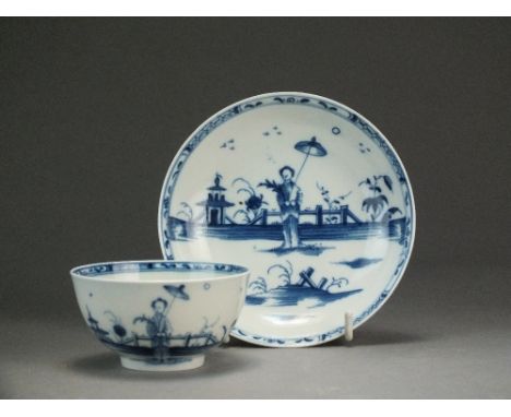A Caughley tea bowl and saucer painted with the Girl with Parasol pattern, circa 1788-85, S mark, bowl 8cm diameter, saucer 1