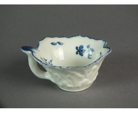 Two Caughley leaf dish butter boats together painted with Geranium Boat Sprays, circa 1776-80, C mark to one, the other unmar