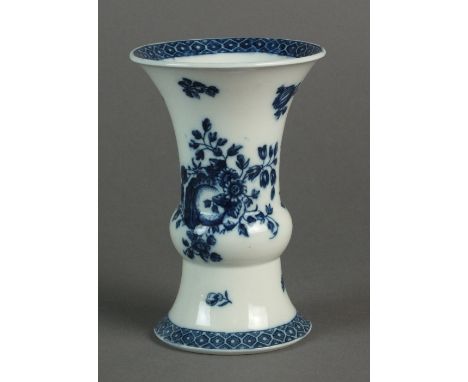 A Caughley trumpet form vase transfer-printed with a Sliced Apple pattern, circa 1778-86, with supplementary fruit and floral