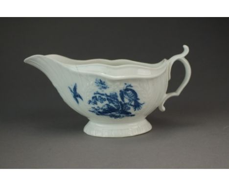 A Caughley sauce boat transfer-printed with the Birds in the Tree pattern, circa 1777-82, unmarked, 8.5cm high (cracked)Prove