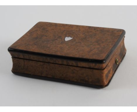 A mid 19th century Swiss burr wood rectangular musical snuff box, the centre of the lid inlaid with a shield shaped abalone c