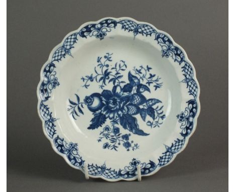 A small lobed Caughley plate transfer-printed in the Pine Cone pattern, circa 1776-86, C mark, 16.5cm diameterProvenance: Wri