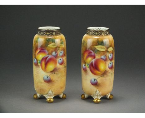 A pair of Royal Worcester fruit-painted vases with reticulated upper rims, shape G42, signed in green, black printed marks, 1