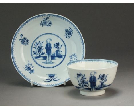 A Caughley tea bowl and saucer painted with the Waiting Chinaman pattern, circa 1776-80, S mark, tea bowl 7.9cm diameter and 