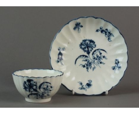 A Caughley tea bowl and saucer painted with the Gillyflower I pattern, circa 1776-78, C mark, tea bowl 7.5cm diameter, saucer
