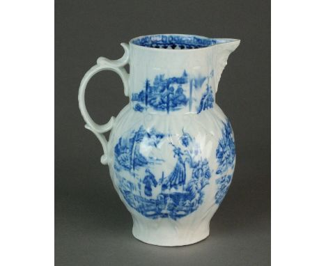 A Caughley mask head cabbage leaf jug, circa 1796-99, transfer-printed in underglaze blue with the Fisherman or Pleasure Boat