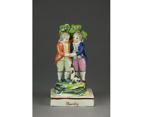 A Staffordshire pearlware figural group of 'Friendship' attributed to Ralph Wood, circa 1800, titled to the base, 18cm high (