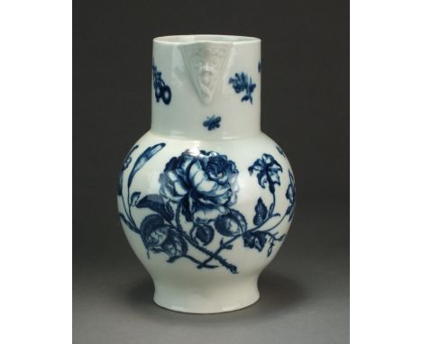 A Caughley mask-head baluster jug, circa 1776-80, the body of plain form decorated in underglaze blue with the Thorny Rose pa