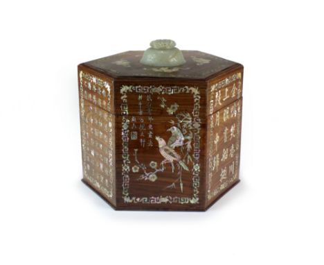 A Chinese mother of pearl and jade inlaid rosewood hexagonal treasure box, Qing Dynasty, the moulded cover with a central nep