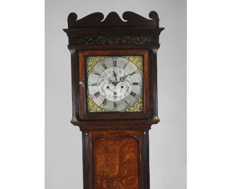 A George III oak crossbanded mahogany eight day longcase clock, the 13 inch square brass dial signed Gillette and Heeley, Man